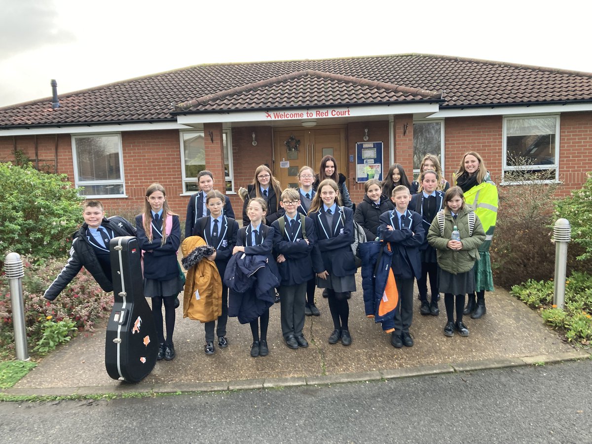 WGSecondaryAcad's tweet photo. Students have gathered to sing Christmas carols and bring festive cheer to the residents of Red Court Care Community. The students presented the residents with crocheted blankets made by the Academy’s ‘Wool Warriors’ enrichment group and handmade Christmas cards. https://t.co/s69bprmF4M