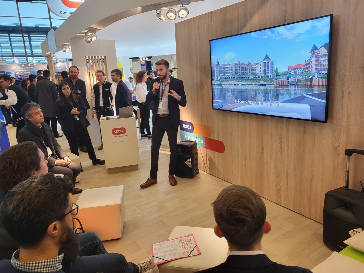 CHBU1's tweet photo. Charles Girard @Bouygues_Immo présente le projet de Marina Seine Parisii, proche de Paris. Un bel exemple de collaboration des entreprises @GroupeBouygues avec une large utilisation du transport fluvial pendant les travaux https://t.co/s6FxPlaSsw