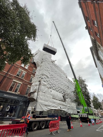 ampsail's tweet photo. We have successfully lifted the generators &amp; associated panels onto the roofs of Berner Street &amp; Wells Street. 

Well done to the team at Berner Street &amp; Wells Street for getting this element of the works over the line.

#loveconstruction https://t.co/2i998S7tLB