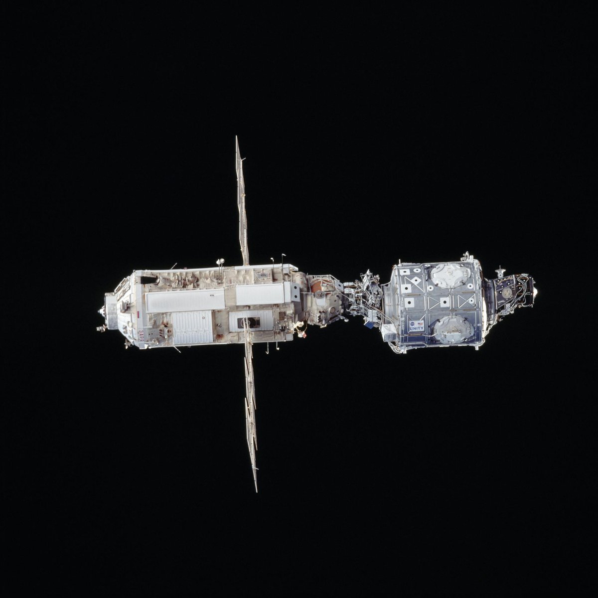 NASAhistory's tweet photo. #OTD in 1998, the first two modules of the @Space_Station were mated together. 🛠 The newly joined Zarya module (on the left) and Unity module (right) are seen here in a photo taken by the crew of STS-88 just before their return to Earth.
Learn more: https://t.co/VTt0wrEhPu https://t.co/chCBjyYXIe