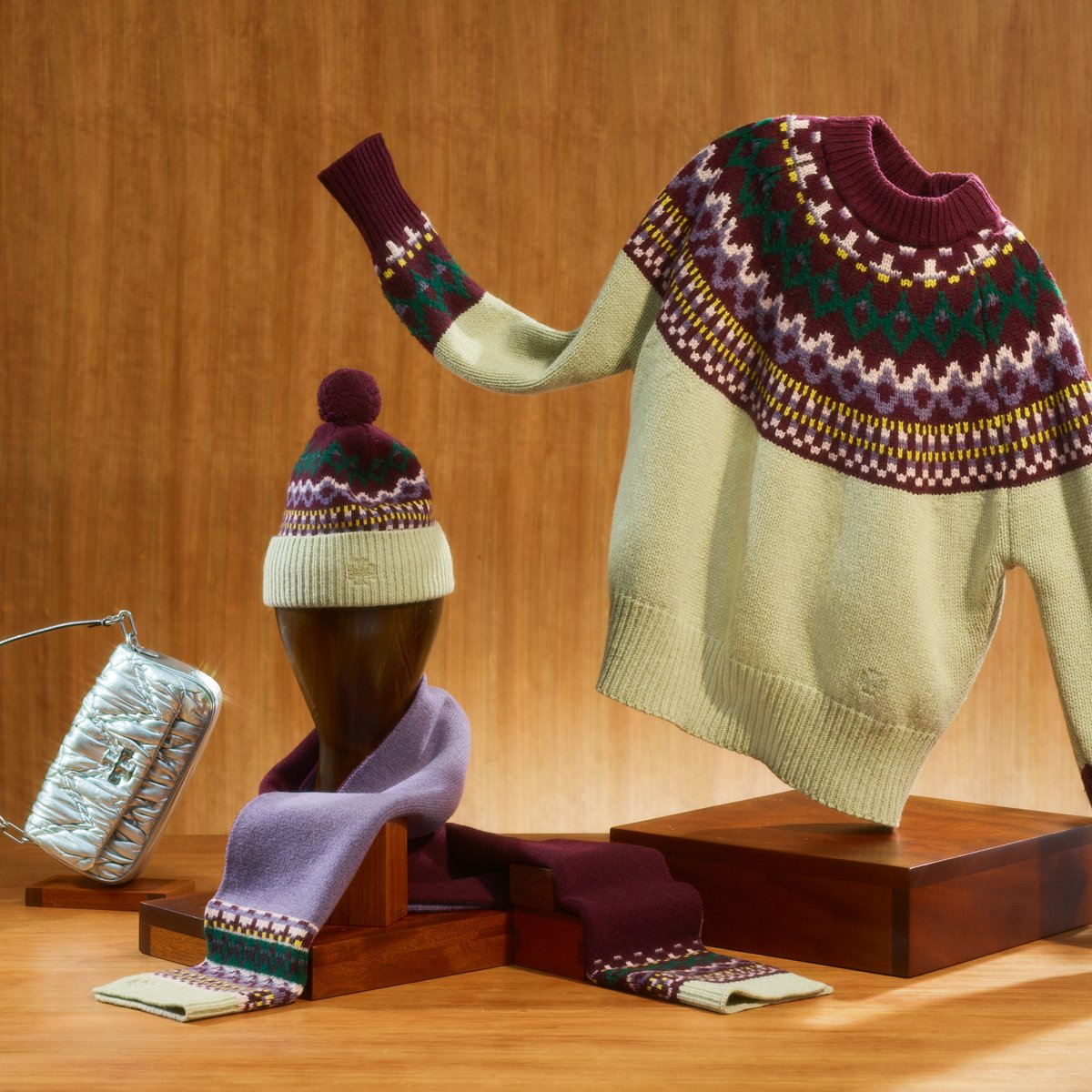 This holiday season, mix up your festive wardrobe with contrasting icons — featuring winter essentials adorned with our classic fair isle pattern and the <a href="/toryburch/">TORY BURCH</a> metallic diamond ruched mini Kira bag. #TorySport