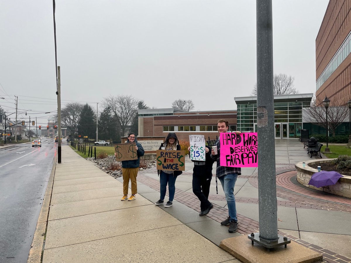 millersvilleu's tweet photo. As a part of their course, students taking SOWK303 study American #socialwelfarehistory. They examined the #minimumwage in PA— then they took to campus with their created slogans and posters, practicing policy assessment and advocacy in a hands-on final exam. https://t.co/hOtkHRuzy5