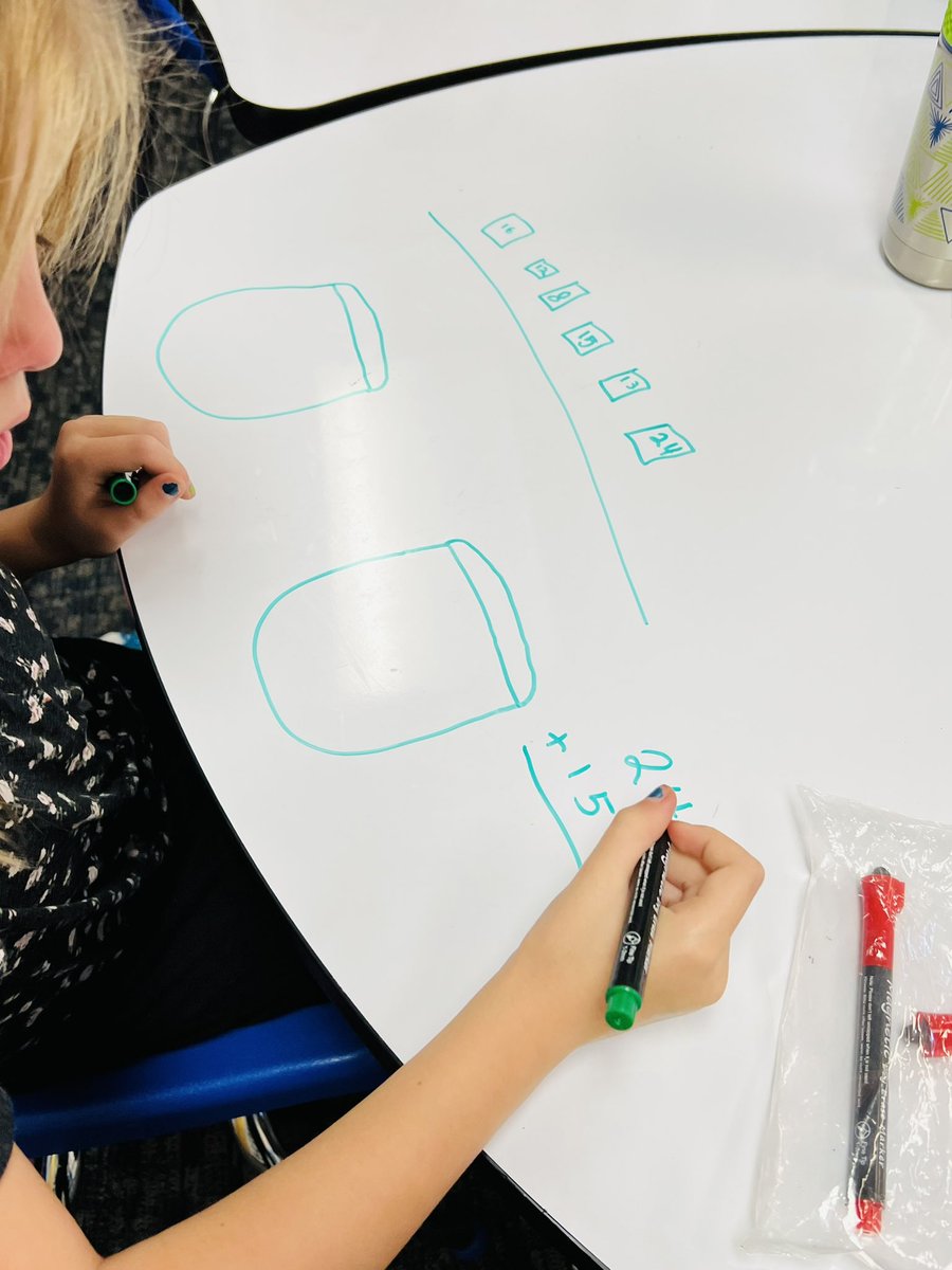 DrKellyHedrick's tweet photo. Rising to the challenge in math today @TWSowl as second graders tackle a problem with @LizaNeedham3. Students learn that many strategies and problem solving routes are just fine. #LabSchoolModel https://t.co/tPVRM3xDJm