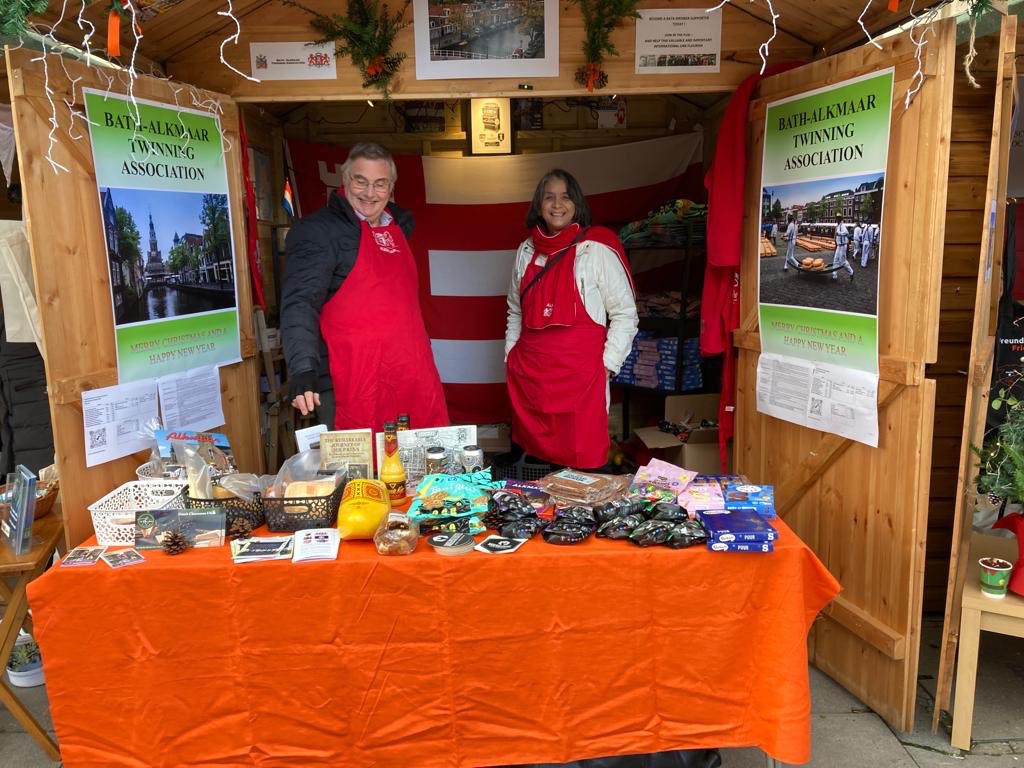 At Bath Christmas Market with the Bath-Alkmaar Twinning Association, selling delicious Dutch cheese, spiced speculaas biscuits, chocolate letters, Alkmaar beer &amp; my book ‘The Remarkable Journey of Mr Prins’! Signing on Thursday 1-4 pm. Find us by Guildhall opposite Bath Abbey.