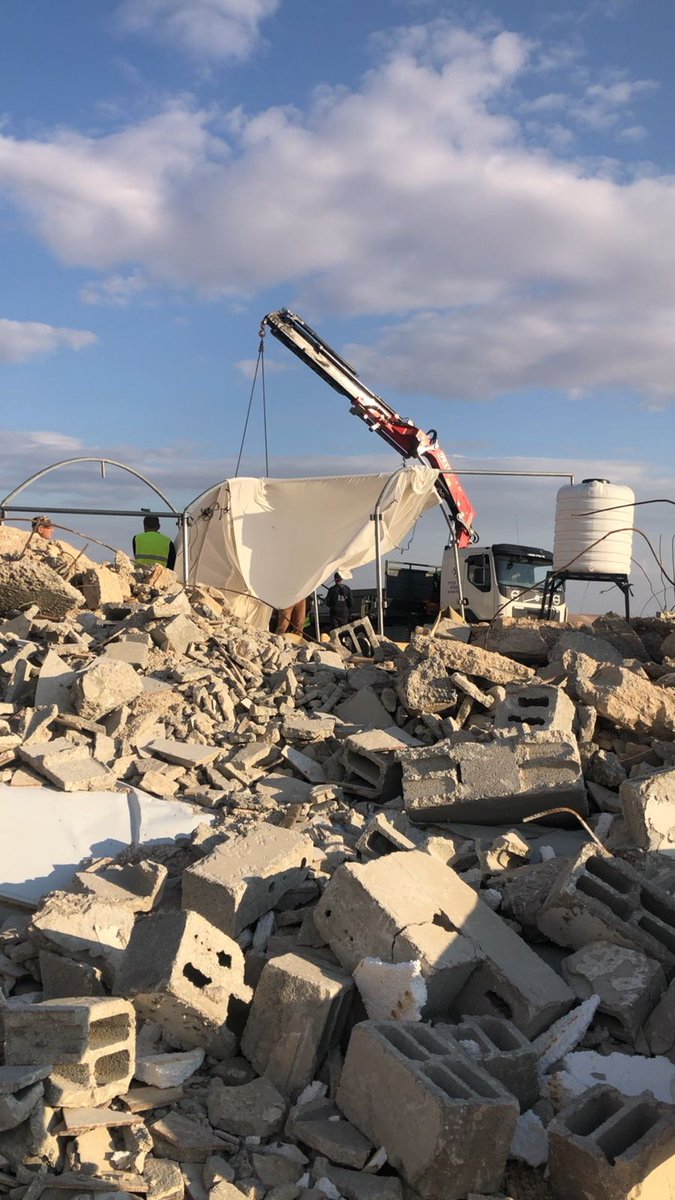 CorpOcc's tweet photo. Shame on British company @JCBmachines and Italian company Fassi whose equipment was used in the demolition of a Palestinian school in Sfai Al Foqha today - this is the 2nd demolition in 2 weeks #BDS #SaveMasafferYatta pics via @ISMPalestine https://t.co/1QvwNmSMog