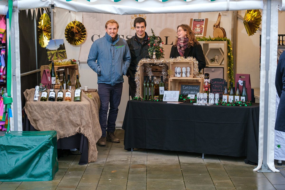 RoyalAgUni's tweet photo. Our students were on duty at the Gloucester Quays Christmas Market over the weekend! Cotswold Hills, our award-winning wine and social enterprise based in Gloucestershire, has become the first UK vineyard to trial the use of Packamama’s flat wine bottles. https://t.co/RzK6MTtuHK