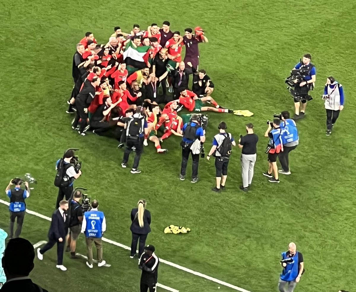 chickukottaram's tweet photo. Morocco celebrate their win against Spain with a Palestinian flag. Here outside the stadium too...
Every North African and Middle East team has made sure that the Palestine issue is prominent at every game
#betterqatar 
#FIFAWorldCup 
#morrocovsspain 
#morroco https://t.co/ZTZkEu2f9O