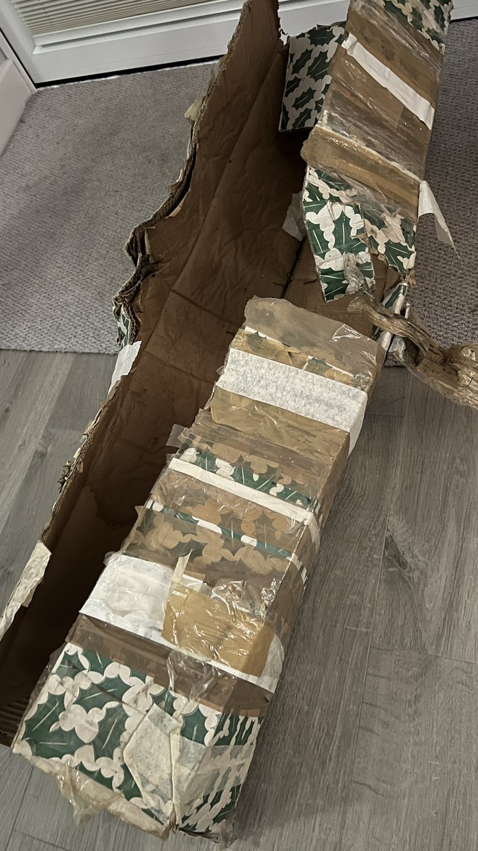 Someone said you can tell the age of an artificial Xmas tree by the rings of tape around the box.