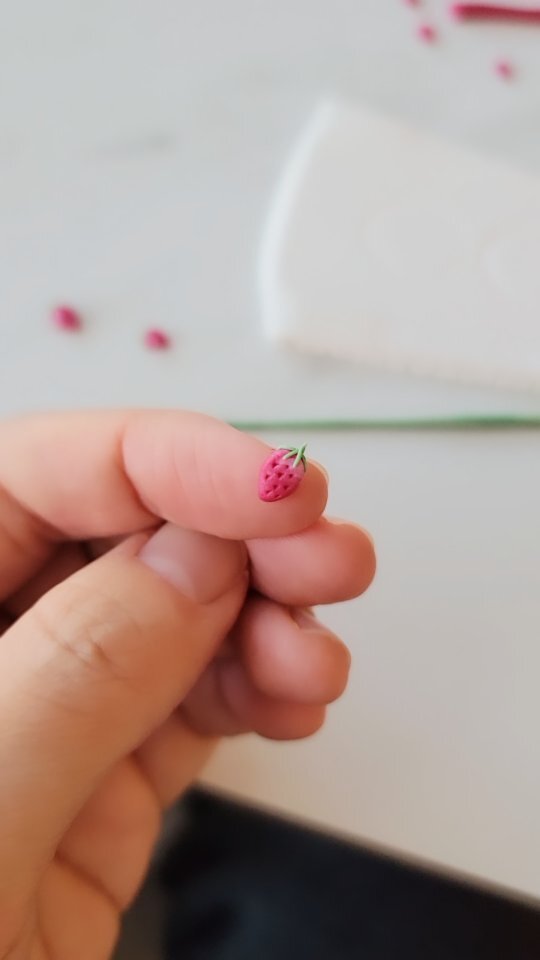 Making process of strawberry earrings 🍓 Comment your favorite fruits 😋  I will make earrings ✨️ 

#howitsmadematters #slowmadejewelry #artprocess #ilovestrawberries #strawberryblonde #cottagecoredecor #polymerclayearrings #handmadeearrings #cuteearri… instagr.am/reel/Cl1k2dKjA…