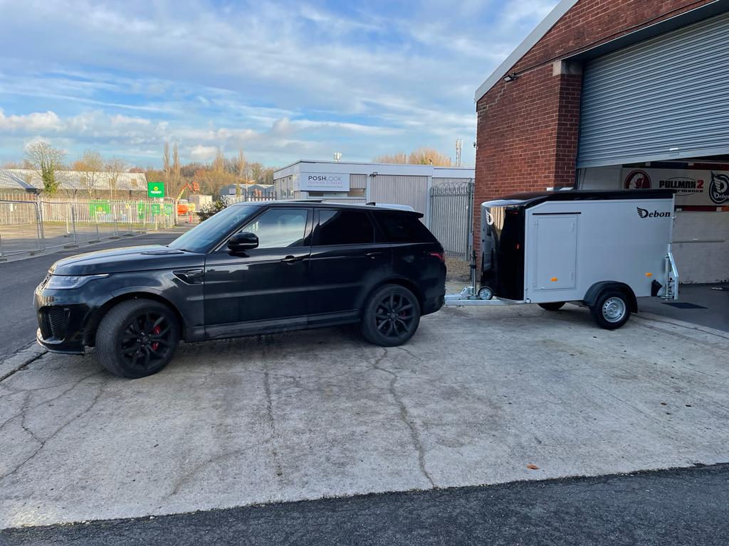 economyvan's tweet photo. Another happy customer towing away a brand New 2022 #Debon C255 Box Trailer with Aluminium Sides 1300kg. Tow with a standard car licence. More trailers now in stock. Free delivery in 2022 https://t.co/xnmITrPnRz https://t.co/NQ1ca6GwEa