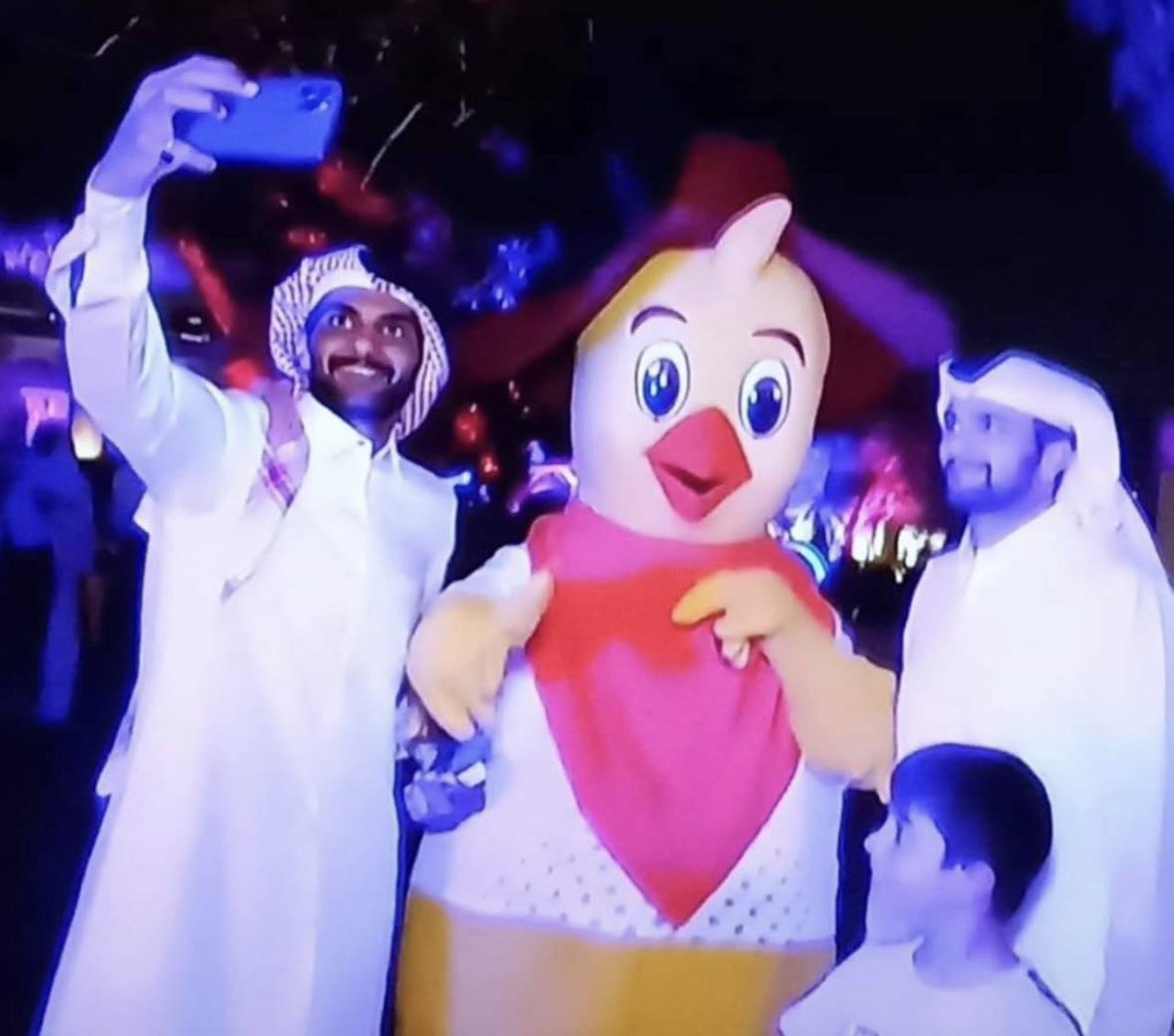 Somebody showed up to a World Cup Game wearing the Pollo Campero costume.