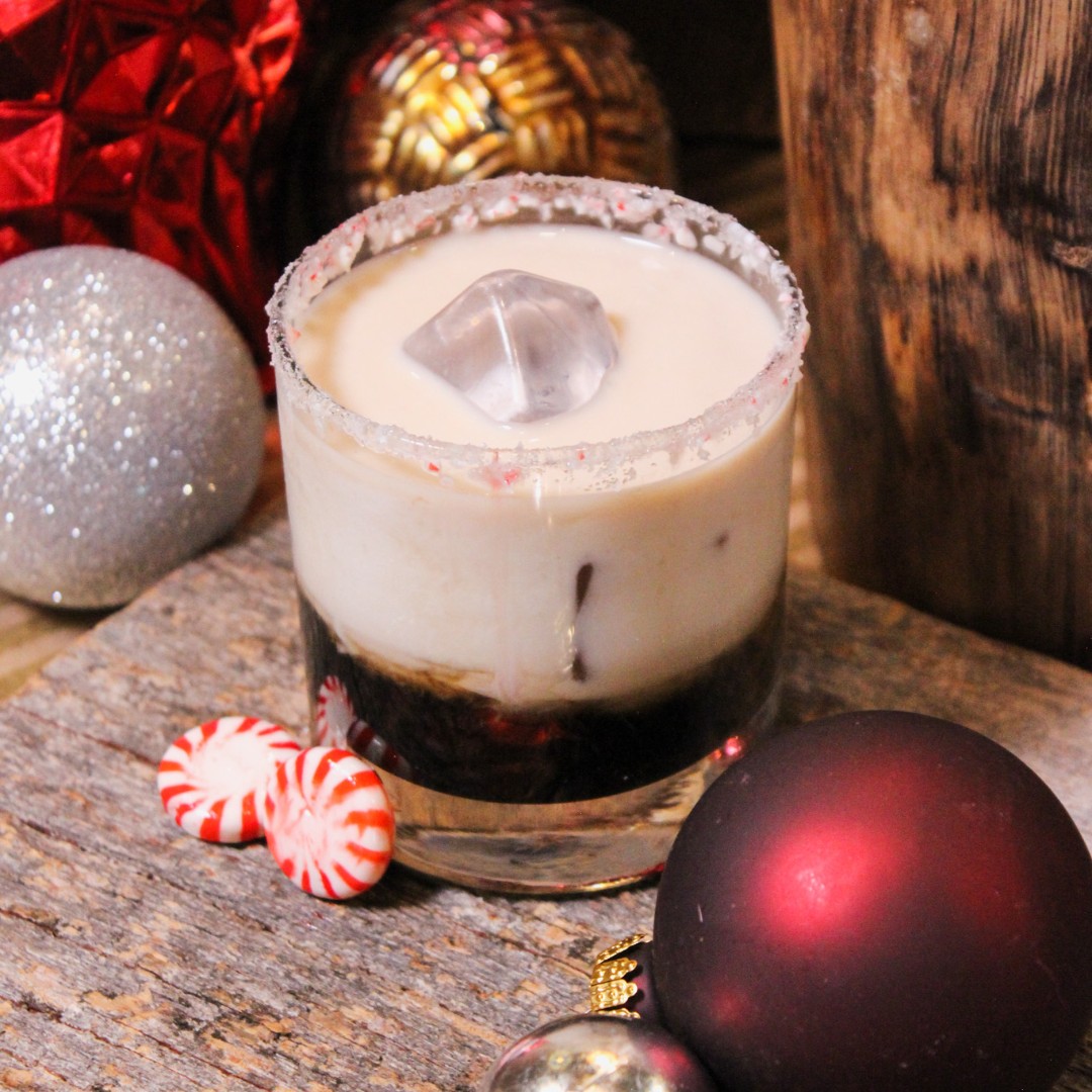 It's beginning to look a lot like cocktails. 🍹

Pictured is our brand new Baby, It's Cold Outside drink. Containing Titos, Peppermint Schnapps, and Kahlua. Stop on in after you visit Enchant! 🎄