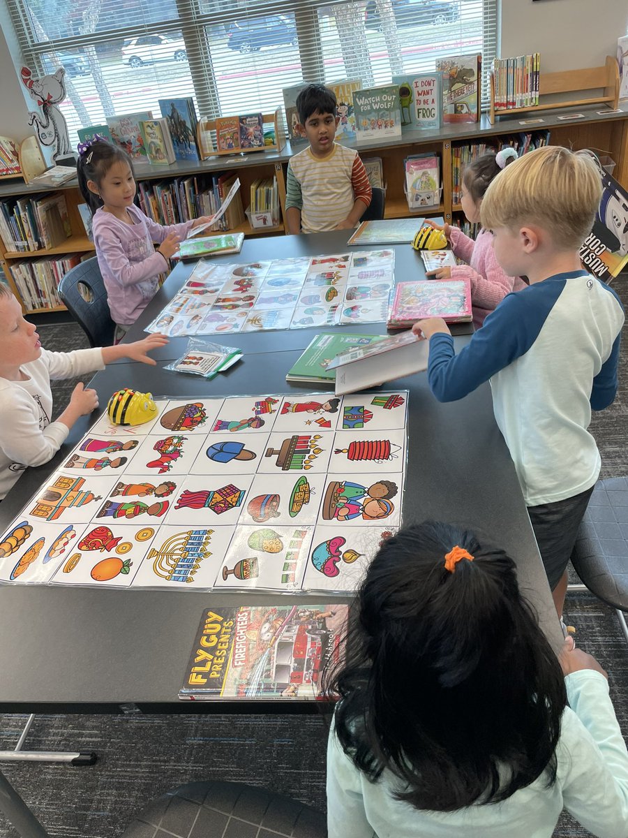MrsVolentine's tweet photo. We got to learn about bee bots and coding during library today! The kids did a great job working together and problem solving when things went wrong. @fisher_reads https://t.co/OcEH3wlgVg