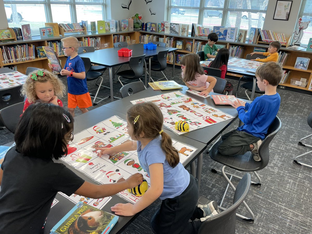 MrsVolentine's tweet photo. We got to learn about bee bots and coding during library today! The kids did a great job working together and problem solving when things went wrong. @fisher_reads https://t.co/OcEH3wlgVg