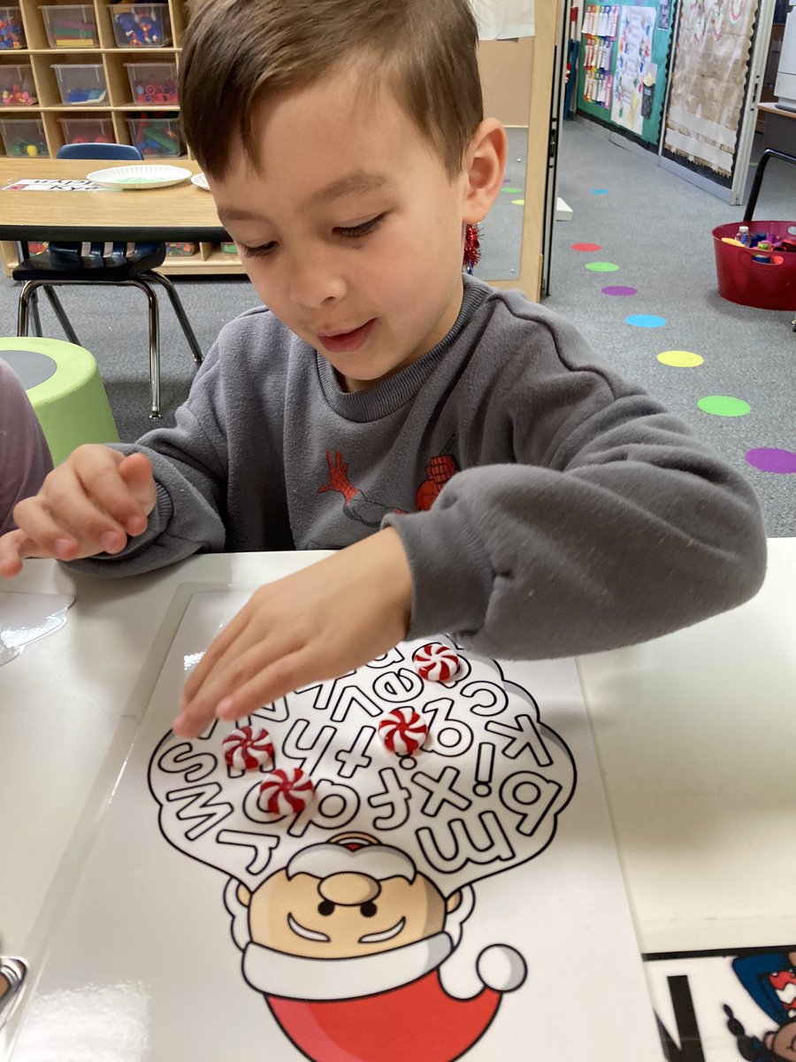 WikMrs's tweet photo. We’re having a blast with our new letter match game during center time! 🎄🎅🍬 #prek #cfbisdprek #cfbprek #furneauxbraves #littlebraves https://t.co/XkbrX3LfDP