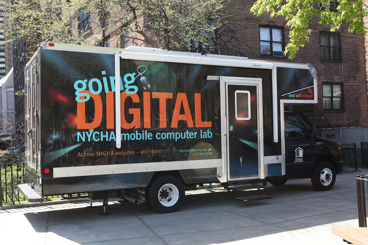 NYCHA's tweet photo. NYCHA #DigitalVans are back to provide @NYCHA residents with Tenant Recertification assistance and act as Internet Hotspots for anyone standing outside the vehicle utilizing their own devices. Check out December's full calendar of stops here: https://t.co/dmzu8keRPG https://t.co/vmyFGcJ2TV