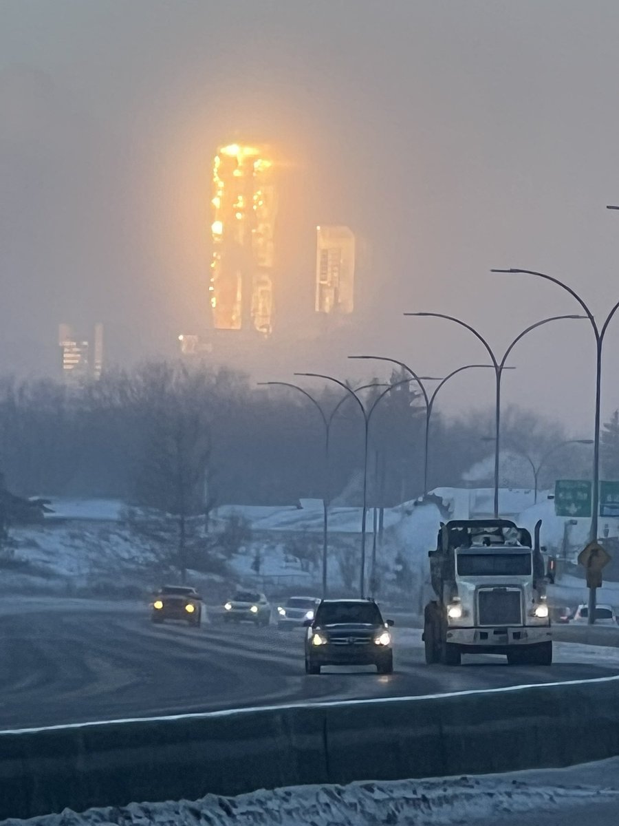 HRProf_Mike's tweet photo. JW Marriott in downtown Edmonton looked like it was on fire this morning.  Fortunately, it was sun reflection and ice fog. @ctvedmonton @GlobalEdmonton (pics taken while safely parked) https://t.co/LjKzVVjf4n