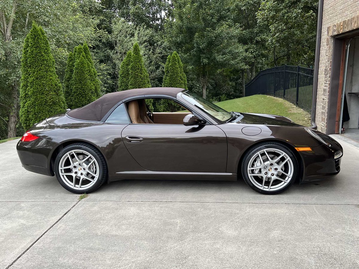 StuttgartStudio's tweet image. Here's something cool: a 2011 Porsche 911 Cabriolet in Macademia Metallic with the Cocoa brown canvas top.  Dare to be different!  Enjoy the framed print! #windowsticker #monroney #911cabriolet #macademia #thereisnosubstitute #germany #rearengine #watercooled
