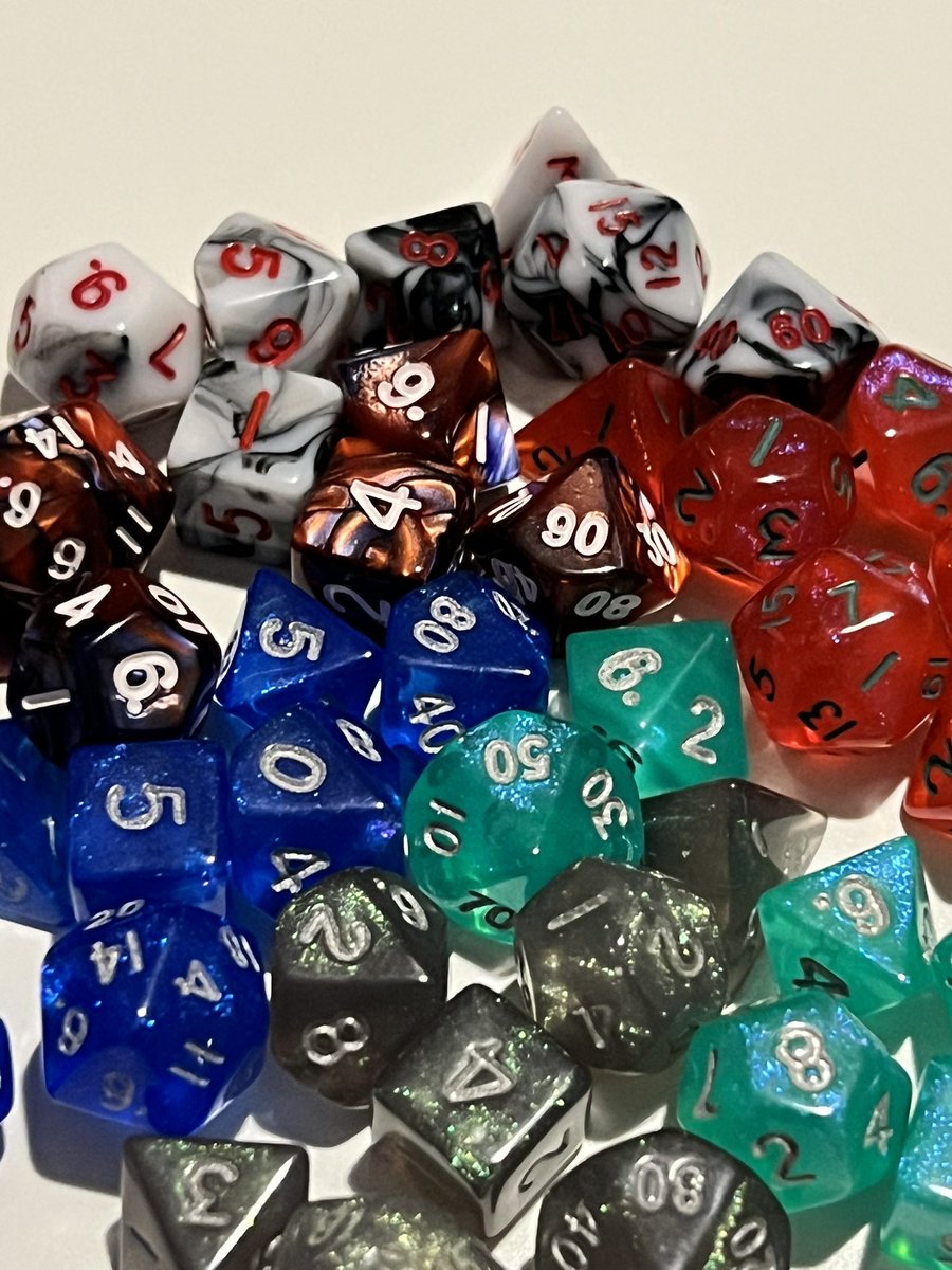 JDogTheJester's tweet photo. And for this month of December, the @TabletopLoot crew continued to impress. A whole smorgasbord of tiny math rocks to enjoy. Have loved being in the #LootTroupe for so long. Thank you for all these amazing dice @thatparksgal and @thatparksguy! https://t.co/LP2xN9yyOD