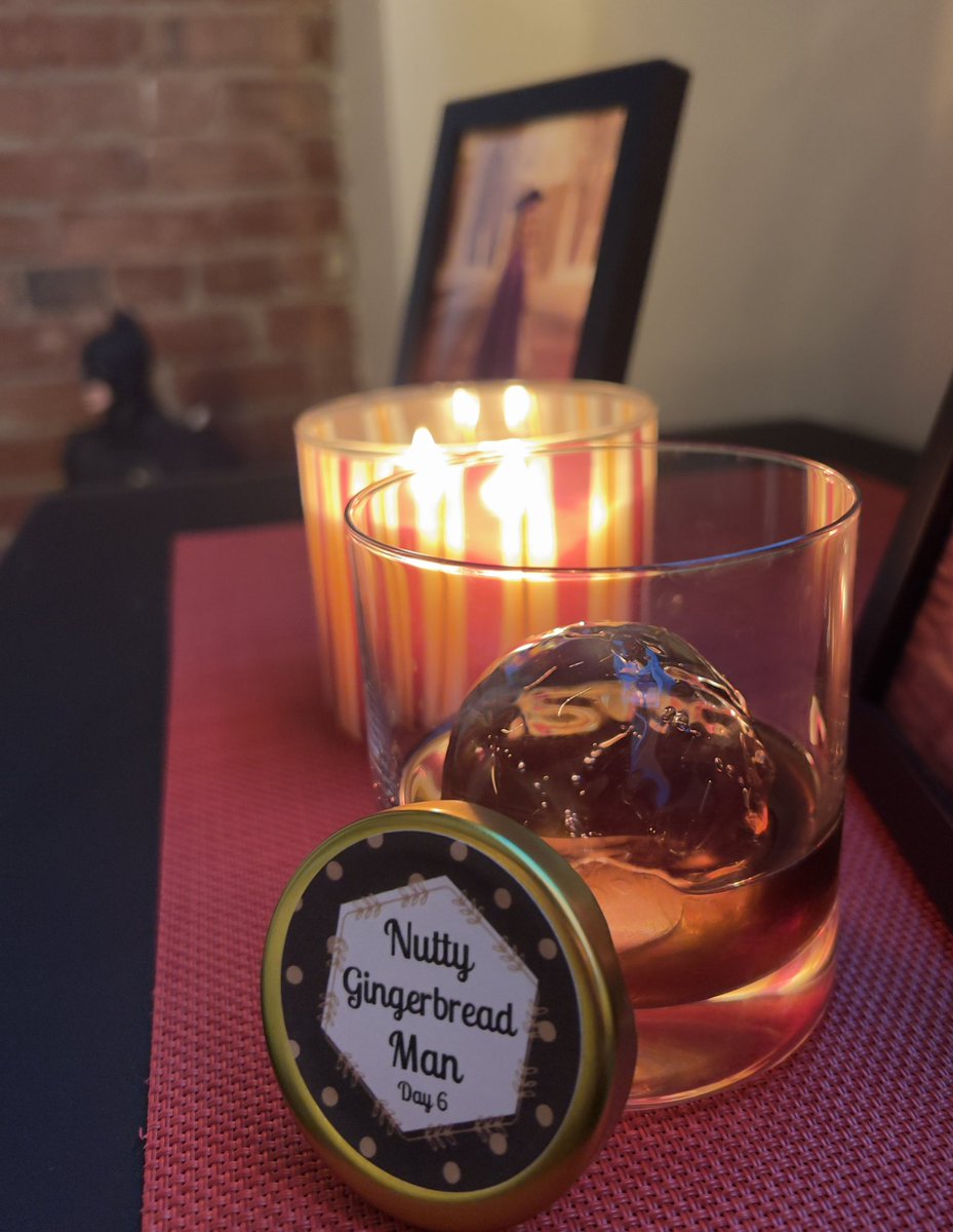 Day 6 Advent Cocktail with my holiday candle (‘Tis the Season scent, of course) and Batman in the background.