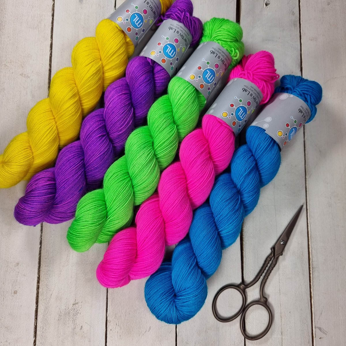 Martin’s Lab Comfy Merino in classic bright colors: Blue Lagoon, Hot Fuschia, One-Eyed Mike, Pop Goes My Heart and Sunny Side Up.