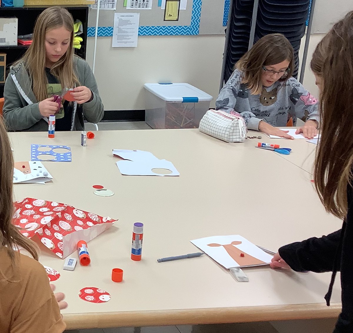 am_RETSD's tweet photo. There is a festive feeling is in the air at Angus McKay as students create holiday cards, decorate the tree, and search for Clementine the Clumsy Elf! https://t.co/tD3dz8r5kU