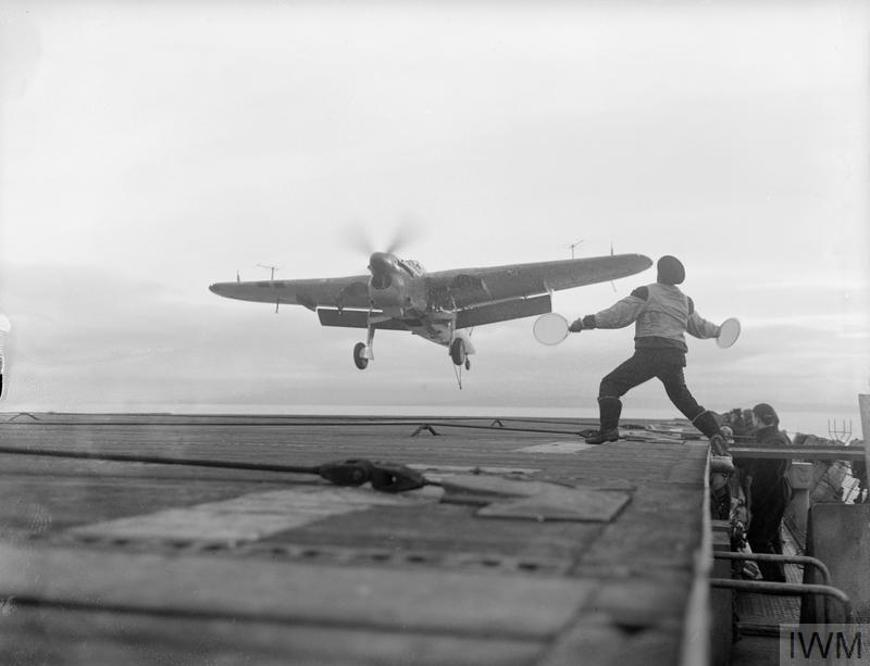 curatorian's tweet photo. Today in 1940 the Fairey Barracuda naval bomber made its first flight. Pictured here a Barracuda, with radar aerial sprouting from its wings, lands on the escort carrier HMS Ravager with a batsman's help, in December 1943. #AvHist #AvGeek
IWM A 21285 / https://t.co/EOXlwJRegr https://t.co/t73dxsU34o