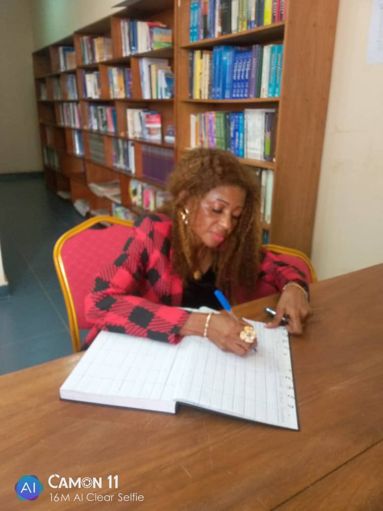 CamTff's tweet photo. Dr. Vivian signing the visitor's register at TFF office, Yaounde https://t.co/vcjUwzcuZh