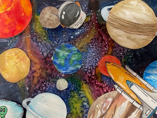 Studio art experiments with watercolor and learns about planets and the galaxy