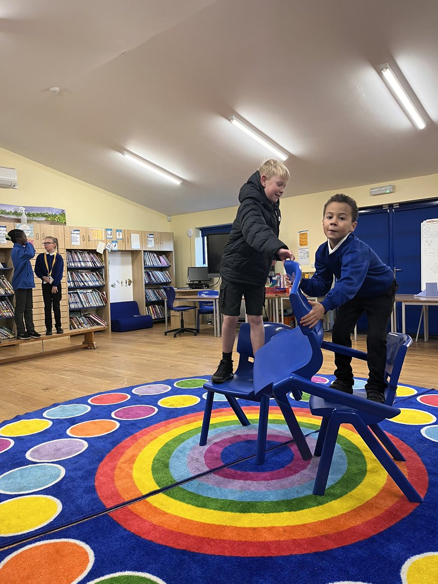 MissfrenchTPS's tweet photo. 5 children and 3 chairs. Can they get across? Of course they can! Teamwork makes the dream work @TemplarsPrimary https://t.co/YSDQJdpqtu