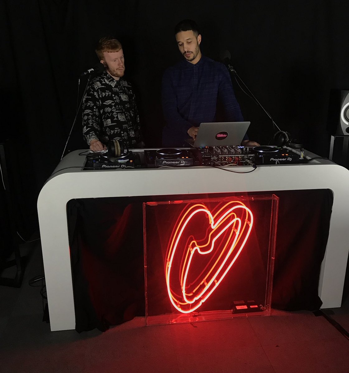 iamcoxhead's tweet photo. Here‘s a photo from the first ever live @Glitterbox radio show we did back in March 2018.

Hired a little studio in Shoreditch, borrowed the DJ booth &amp; mics that barely worked

We’ve come a long way @MelvoBaptiste &amp; @Cameron_S66CAM - proud of us. 🙏🤍 https://t.co/AMOTv3irNT