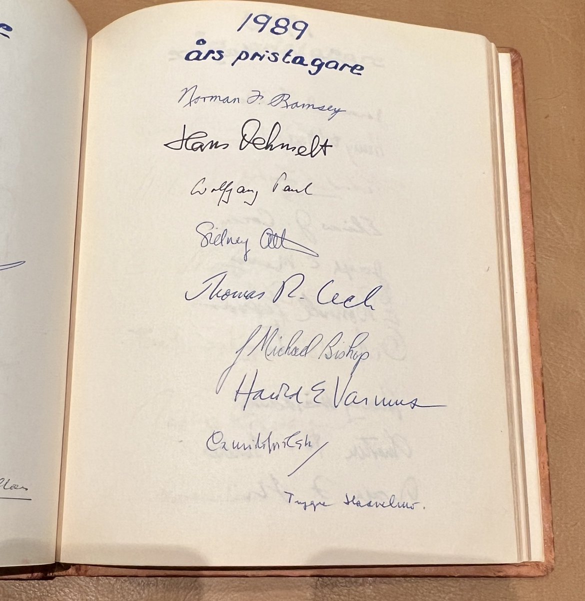 Got to sign The Book at the Nobel Foundation. Admiring signatures of some prior Laureates! #NobelWeek