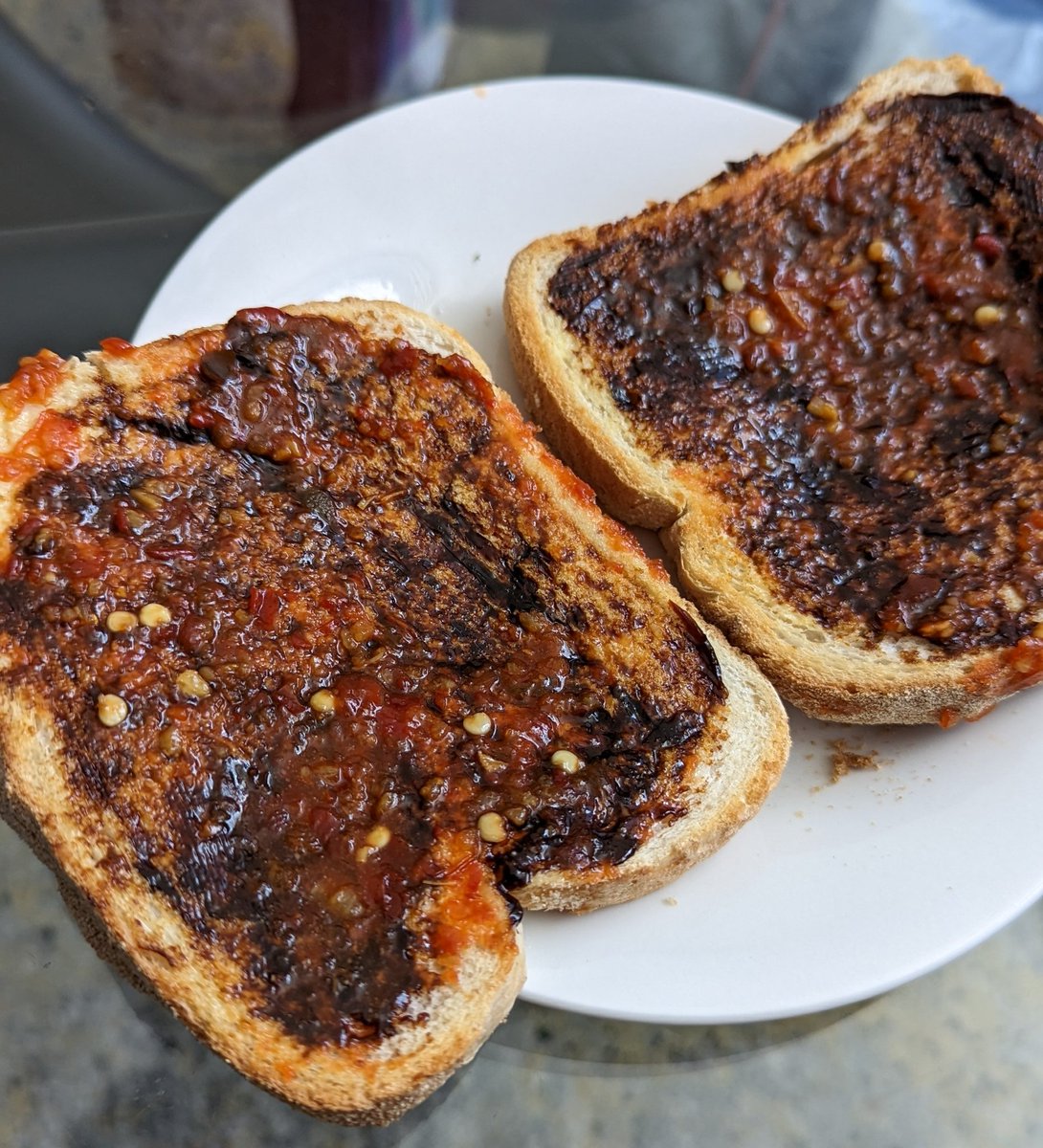 ok this one's for the vegemite enjoyers

put chilli garlic or sriracha sauce on ur vegemite toast TRUST me

if ur not a vegemite enjoyer (wrong) please ignore this tweet.