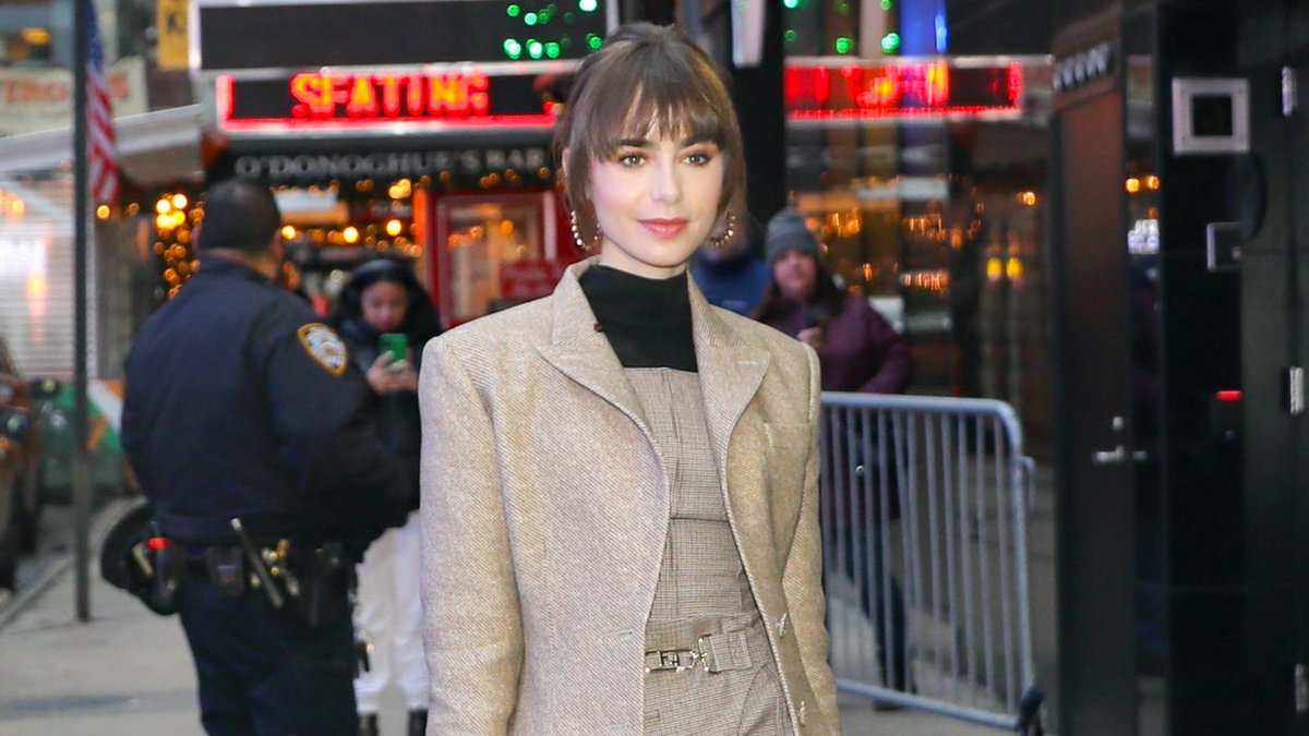 Lily Collins nails a modern take on French dressing vogue.cm/JCALq2r