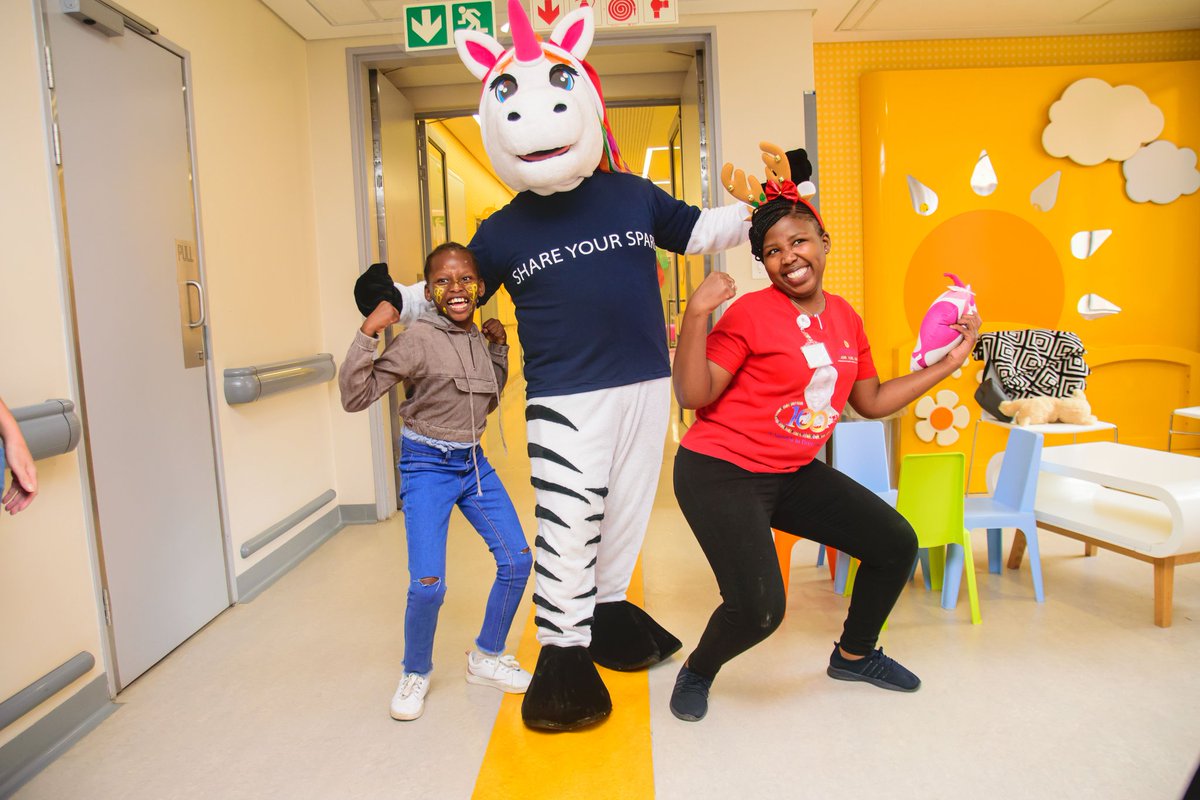 tellorgza's tweet photo. We were invited to attend the @_NMCH_ Christmas party yesterday and what a special time it was. Zane had his Christmas hat on and went to the various wards to wish the kids a Merry Christmas. We were joined by the @SWEAT1000 team who handed out gifts to the kids. 🌲 https://t.co/xiUcr3M4kU