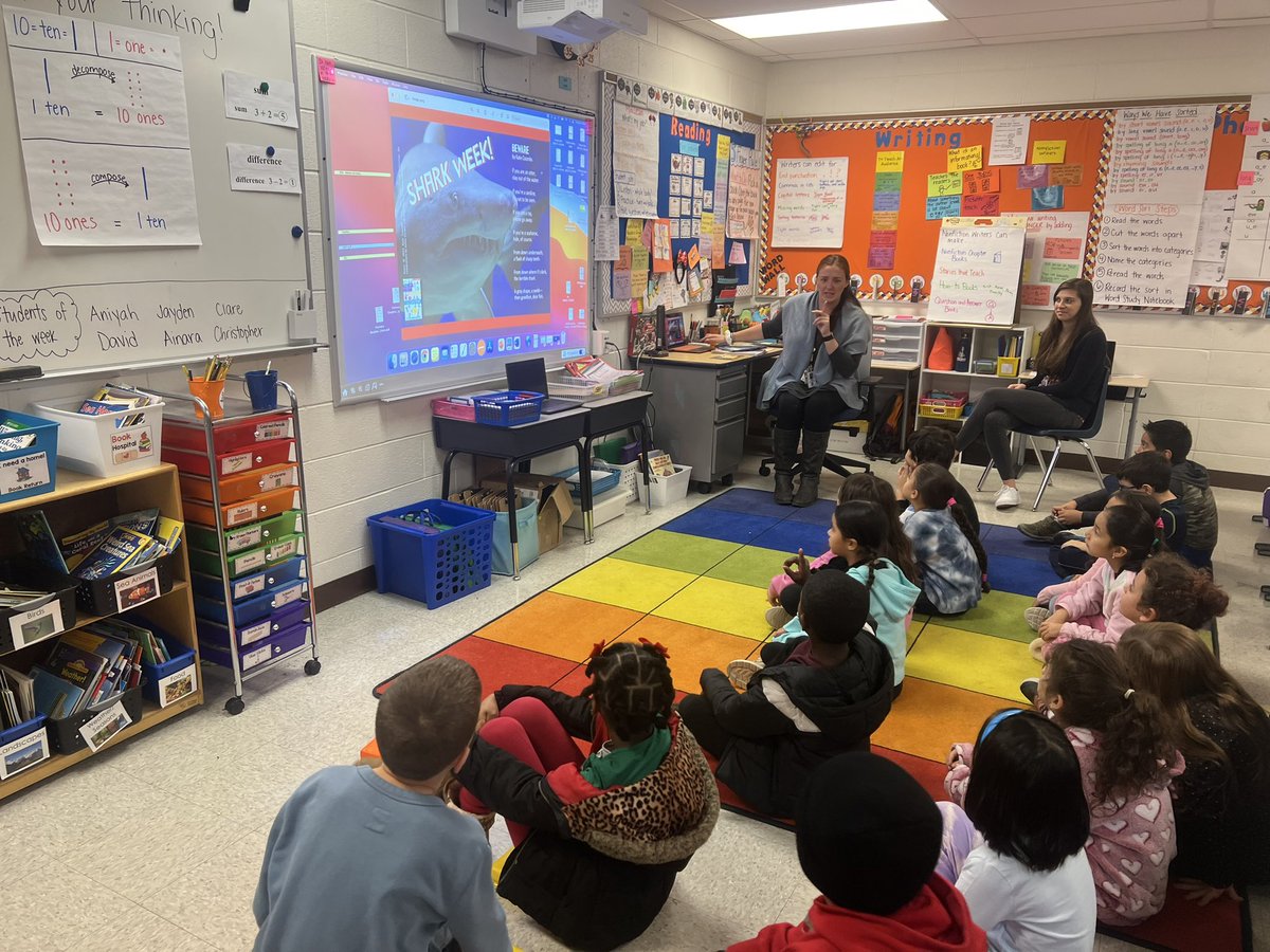 StadleyRough's tweet image. Sitting in front of/in back of a reading partner for shared reading about SHARKS 🦈! #STRreads #STRsecondgrade