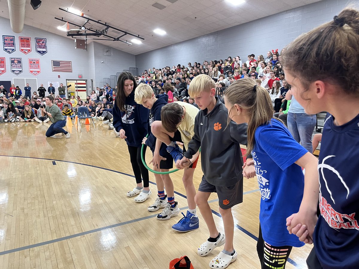 LibertyMDL's tweet photo. The winter pep rally did not disappoint.  We had lots of amazing accomplishments to celebrate! The teachers used teamwork to take home the win for the relay race, but the 8th grade won the coveted spirit stick! #libertyms https://t.co/EpDwB0JeiK