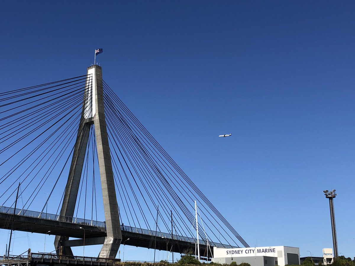 kent_teague's tweet photo. Stunning morning here in @cityofsydney - feat. The NZ flag proudly over ANZAC bridge and a @FlyAirNZ jet coming in to land! https://t.co/0iprdDLfhh