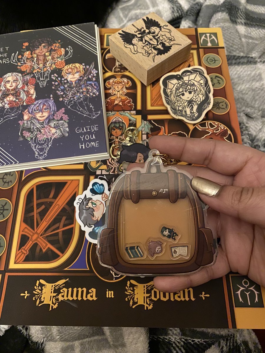 i got my <a href="/FaunainFodlan/">Fauna in Fodlan @ Leftover Sale Ongoing</a> zine!! everything looks so good! i esp love this cute backpack charm with a tiny linhardt inside!!! 💕 i took a quick glance at all the pages &amp; am super excited to go back &amp; take my time looking at each piece! 🥰
