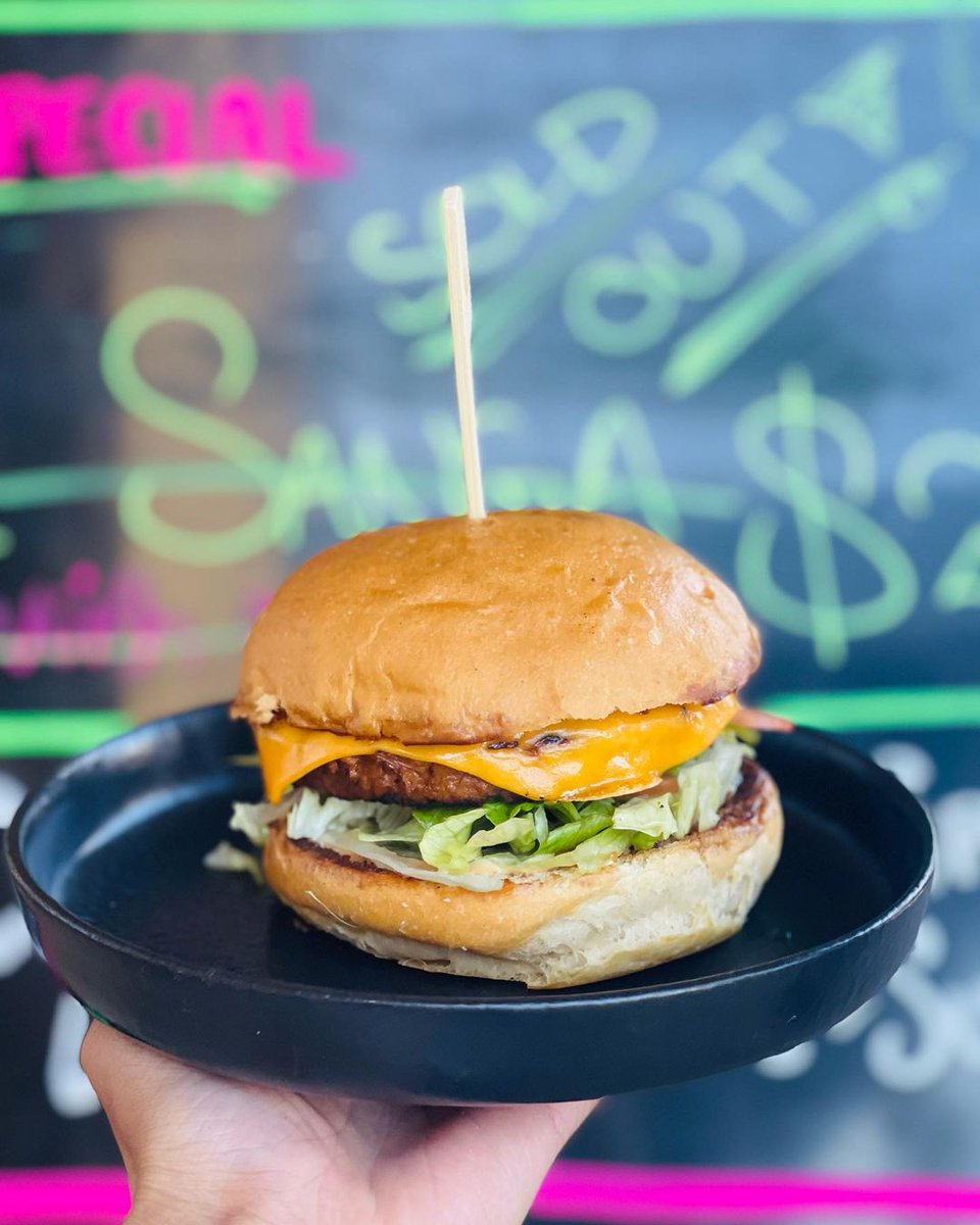 It's love at first bite with this beauty from @georgealroy? 😍 📍: 69 High St, Mansfield VIC #plantbasedfood #v2burger #v2food #v2venues #victoriafood