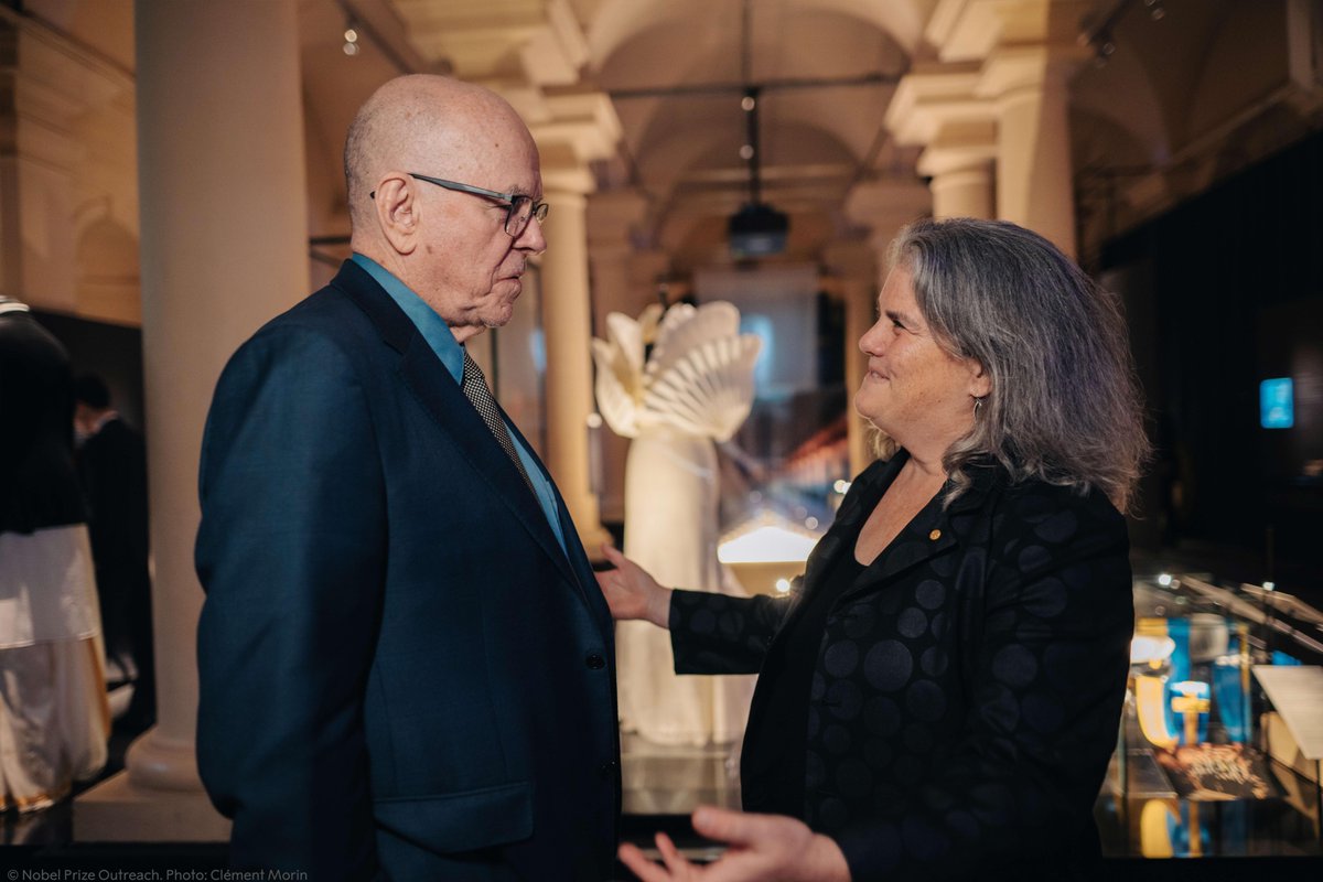 NobelPrize's tweet photo. When physics laureate Andrea Ghez and chemistry laureate Barry Sharpless met in Stockholm, Sweden: 

Ghez: Prof Sharpless I just wanted to introduce myself. You were my professor at MIT! 
Sharpless: Oh is that true? Hope I didn’t hurt you too much! 
Ghez: Oh no not at all! https://t.co/qRO5jqTLM6