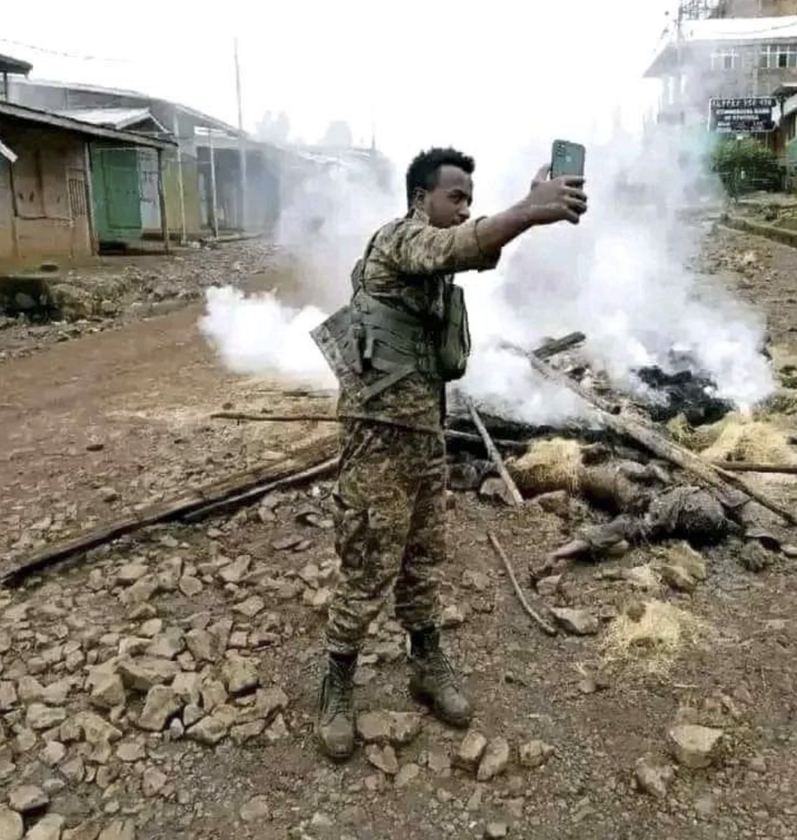 Fano Amhara terrorists are posting selfies across social media platforms next to the bodies of innocent Oromo civilians they massacred en masse. Oromo Lives Matter  <a href="/AP/">The Associated Press</a> @HRW <a href="/UNHumanRights/">UN Human Rights</a> <a href="/IMFNews/">IMF</a> <a href="/WorldBank/">WorldBank</a> <a href="/EIB/">European Investment Bank</a> <a href="/EIBGlobal/">EIB Global - account inactive</a> <a href="/StateDept/">Department of State</a> #AbiyMustGo