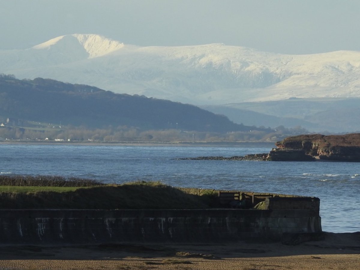 Snowdonia looking majestic, viewed from Hoylake this morning.#Snowdonia
