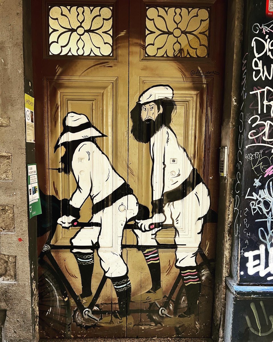 Some street art from the Gothic Quarter here in Barcelona. Although I adore large old doors, I really like this painting. #StreetArt #gothicquarter #barcelona #biking