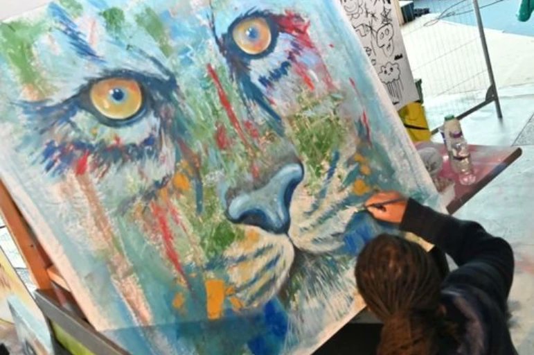 ArtofTonyNero's tweet photo. A couple of clicks by @miketheyokel from a couple of weeks ago at #Korpfest #looksliketonynero working on this big guy in acrylics. @Korporate #paintjam #Peterborough https://t.co/TfJWlrKs42