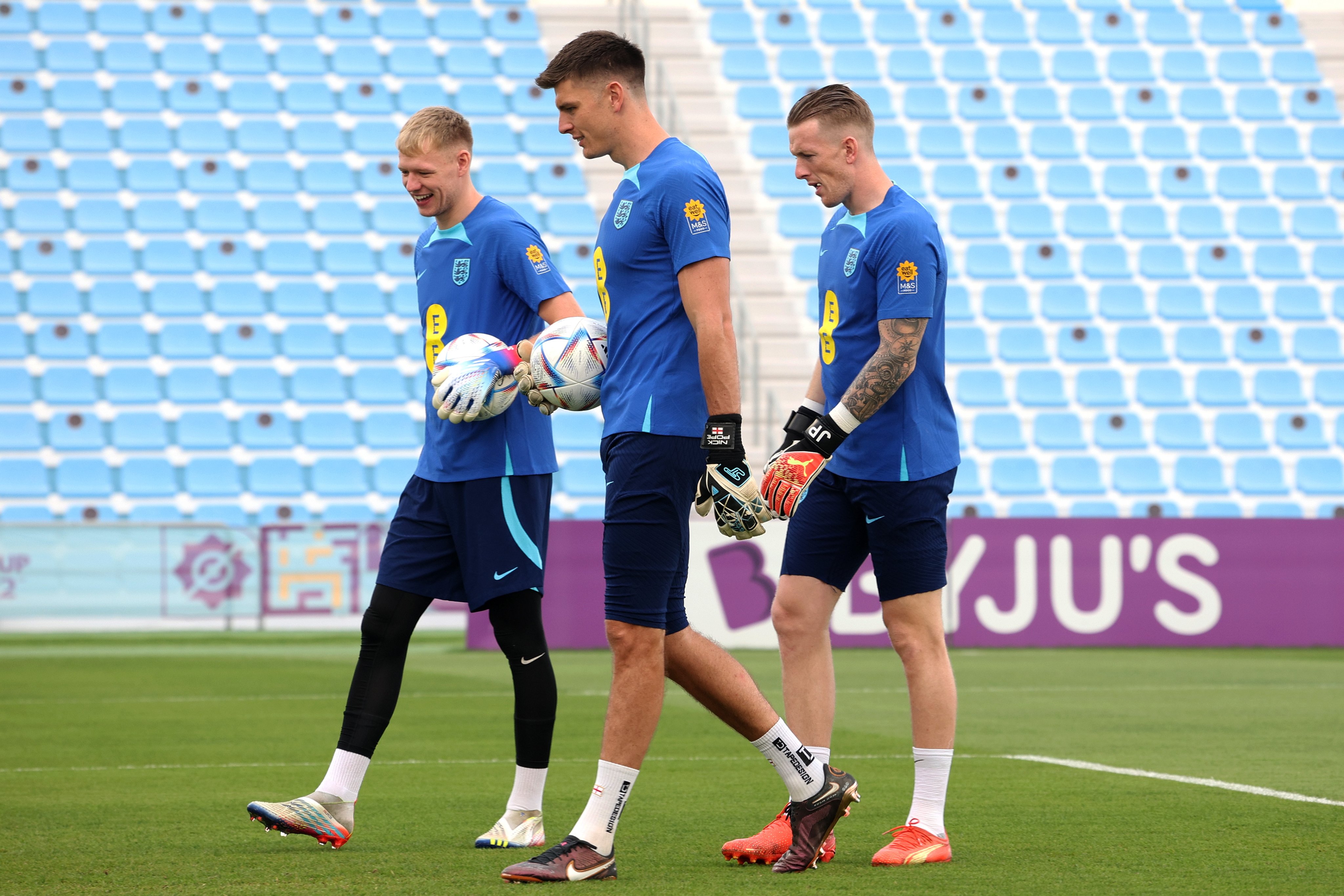 Aaron Ramsdale, Nick Pope and Jordan Pickford walking in training.