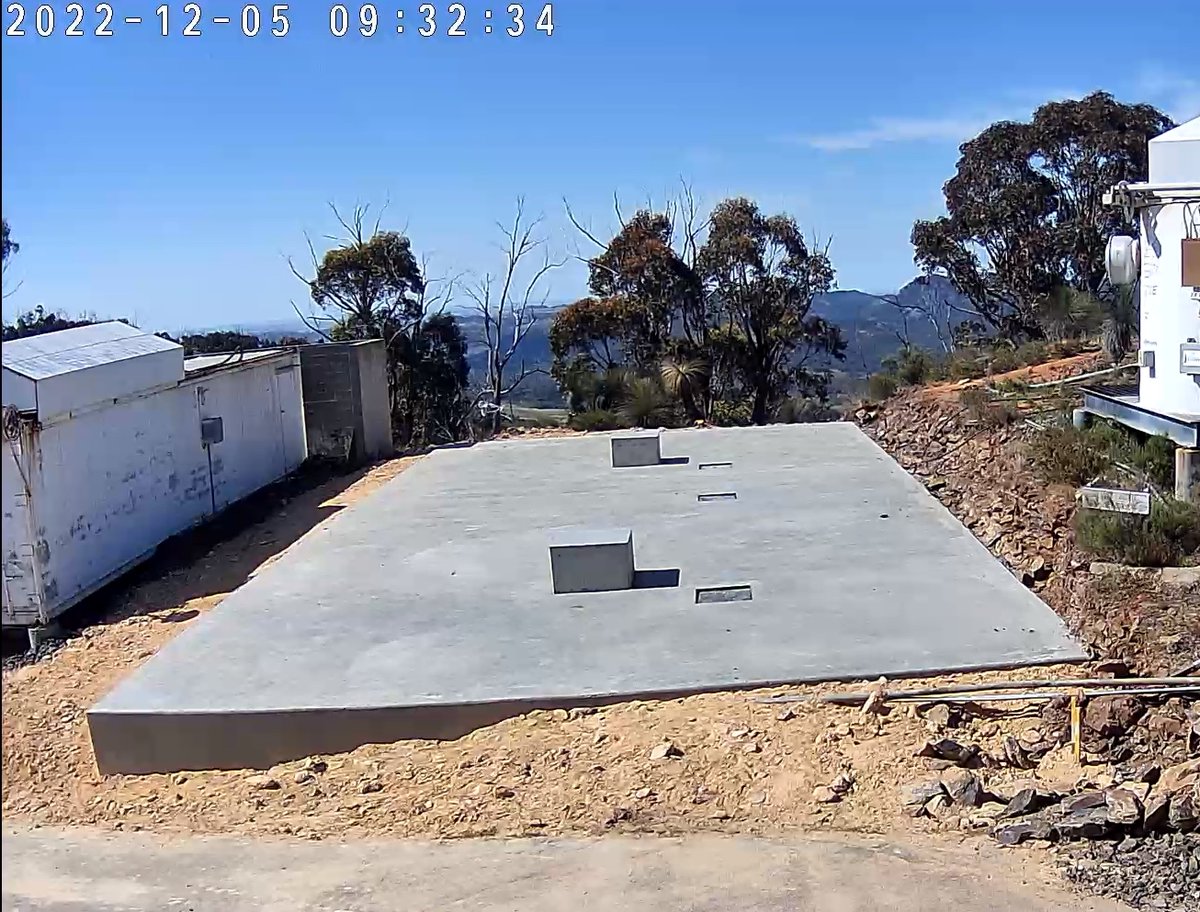 GOTOObservatory's tweet photo. After some long delays including from serious flooding in parts of NSW, the platform for our GOTO-South node at @SidingSpring was finally completed in late November. This week collaboration members Paul Chote and @DuncanKGalloway visited to assemble the domes https://t.co/2WVBsivuRB