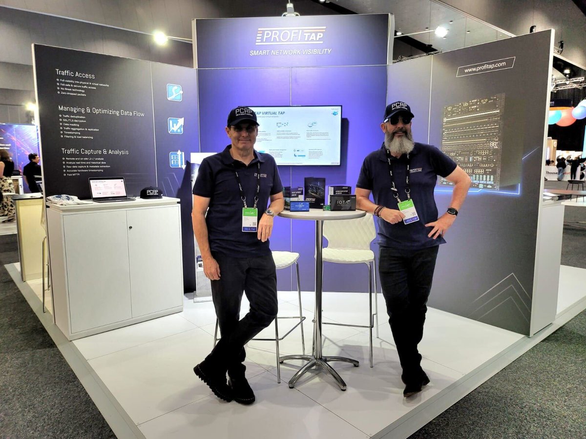 Profitap's tweet photo. @fit70z &amp; Sergio taking the #pcaporitneverhappened look to another level at #CiscoLiveAPJC in Melbourne! 😎

Lots of interest in our IOTA packet capture &amp; analysis solution. Come check out our live demo if you didn't already! 

#IOTA #ProfiShark #NetworkTAP #NetworkPacketBroker https://t.co/OOVCeap1cV