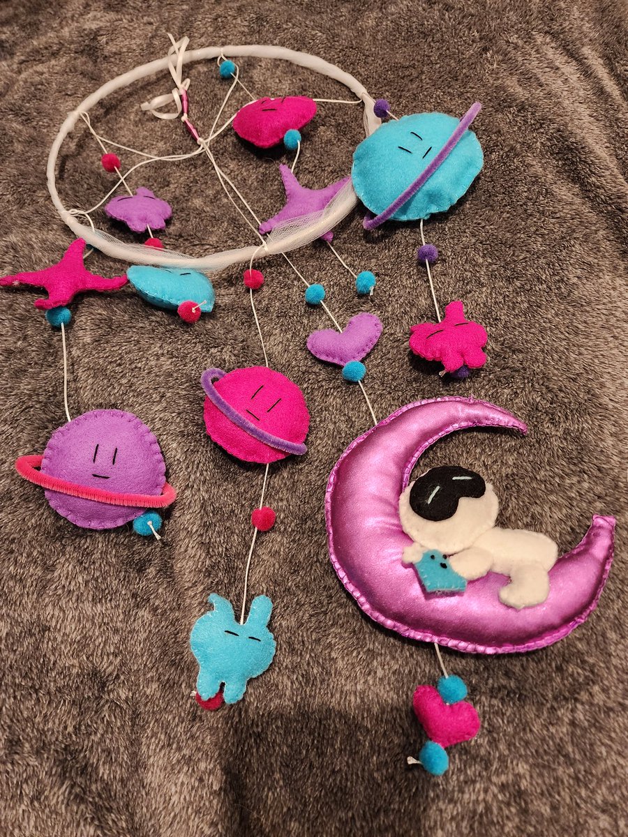 CarleePop's tweet photo. Made my 1st mobile ever for the #Wootteo_ARMY_EVENT, which rotates and plays #TheAstronaut. 

A labor of love, I drew patterns, cut felt, and hand-sewed the dangles over the course of several days. Enjoy! 

#Wootteo_ARMY_EVENT
#jin
#TheAstronaut https://t.co/NQPSatXwa1