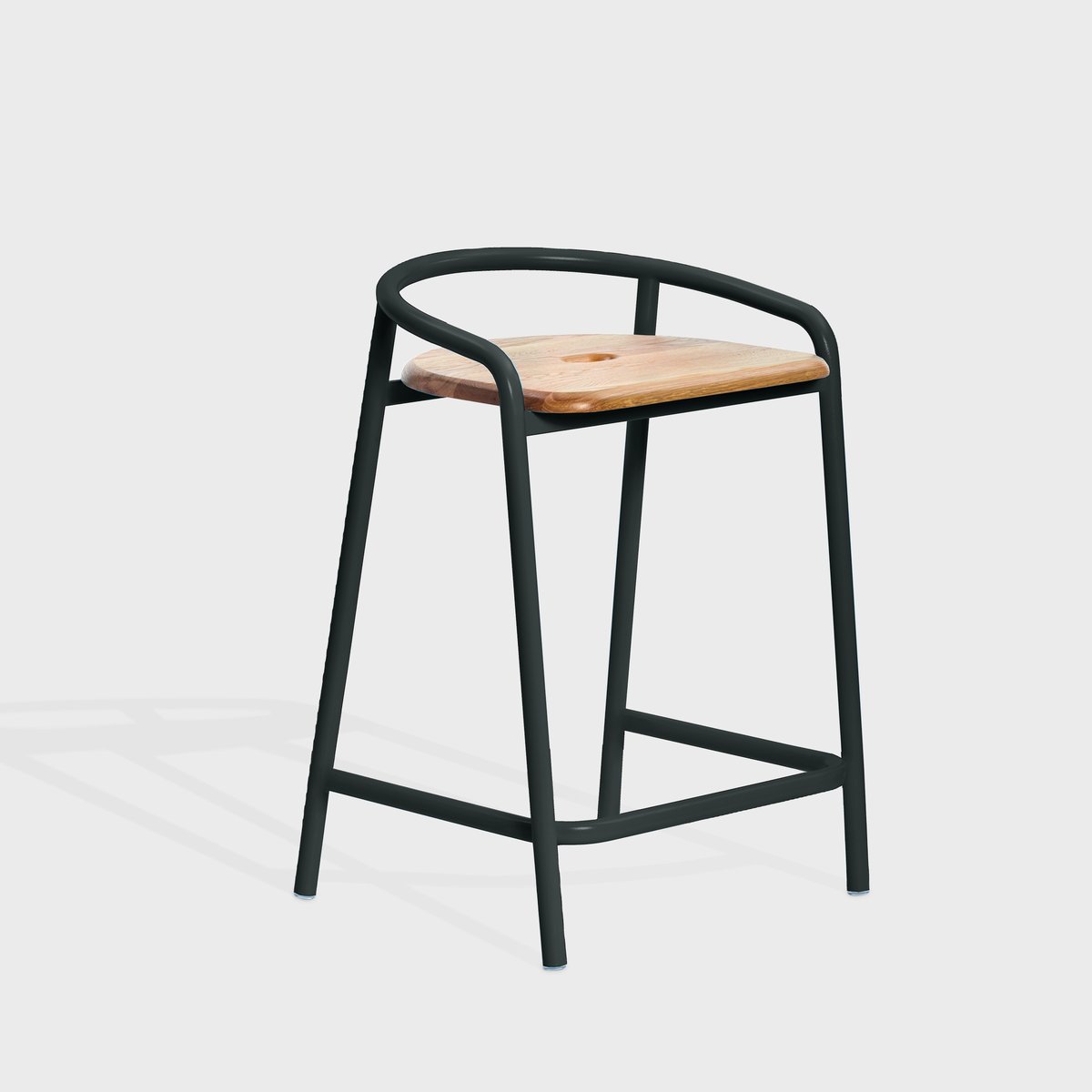 Like Keilhauer, Division Twelve is a design-focused and environmentally-conscious company. The brand’s Bender stool is modern and elegant in this classic jet black powdercoat and white oak seat configuration, beautifully complementing this office dining space.